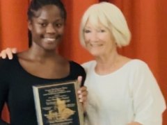 Joyce-Derival-receiving-Dr-H-C-Alexis-Award-from-Christianne-Millet-Alexis