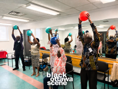 Participants-raise-their-hands-during-a-group-exercise