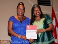 photo credit-Katrice Bent, Carol Campbell winner of Community Builder Award, presented by Sarah Onyango
