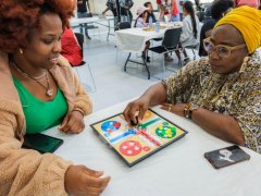 7.-Attendees-engage-in-a-game-of-Ludo-during-the-traditional-games-session